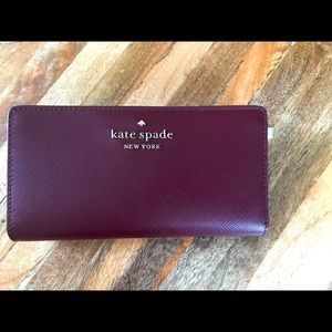 Kate Spade bifold wallet. Brand whew with tags